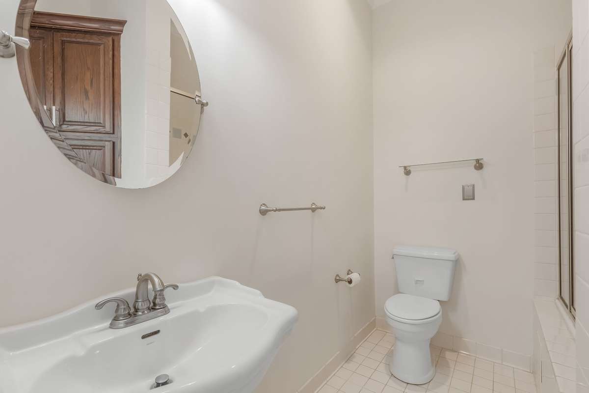 Each bathroom has tiled showers and a soaking tub along with linen cabinetry