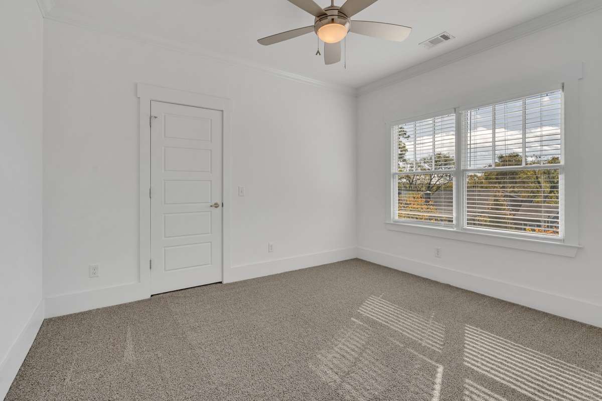 3rd Upstairs Bedroom with walk-in closet.