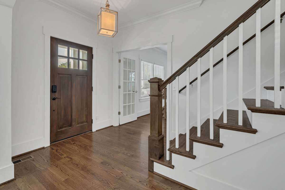French doors lead to a flex space-currently being used as an office/meeting room but could also be a Den or playroom for kids.