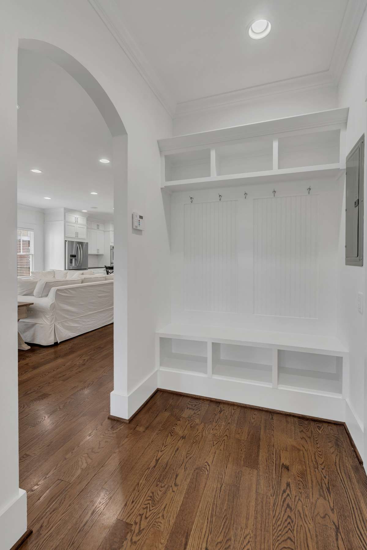 Walk in from your 2-car garage and drop your belongings in your freshly painted mudroom.