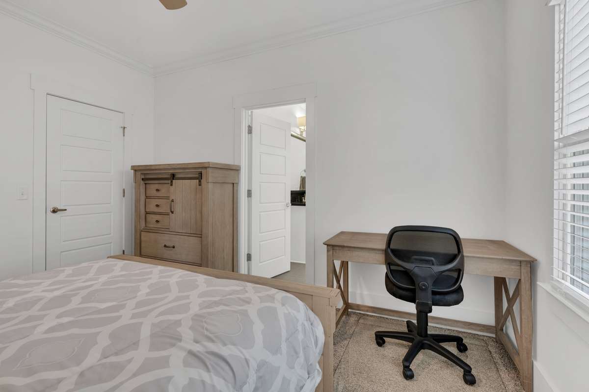 Walk in closet and plenty of space for a nightstand, chest and desk.