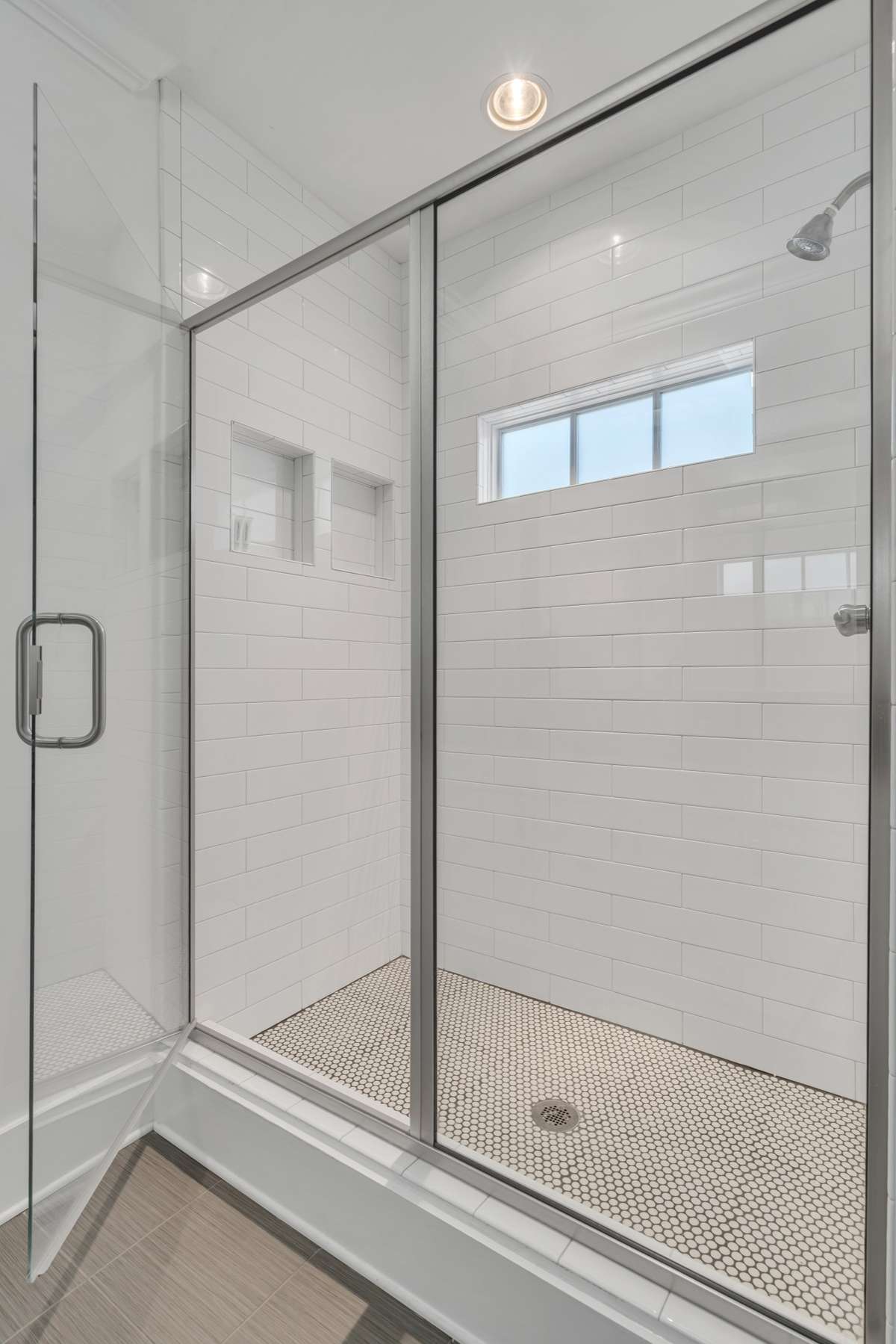 Tile shower and floor.