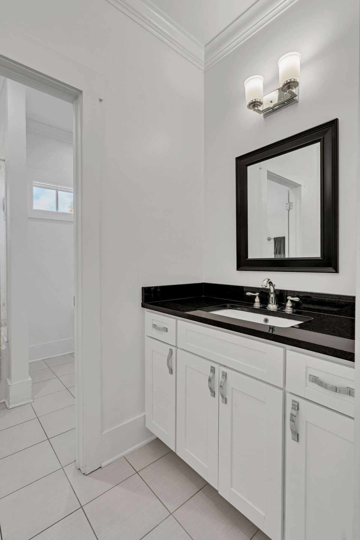 Upstairs Bath cabinets have been freshly painted.