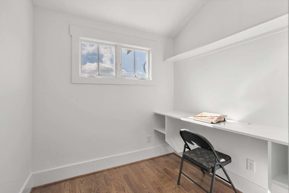 Does someone need an office upstairs too? Looking for a homework spot, or storage? Look no further than this amazing space with a pocket door for privacy.
