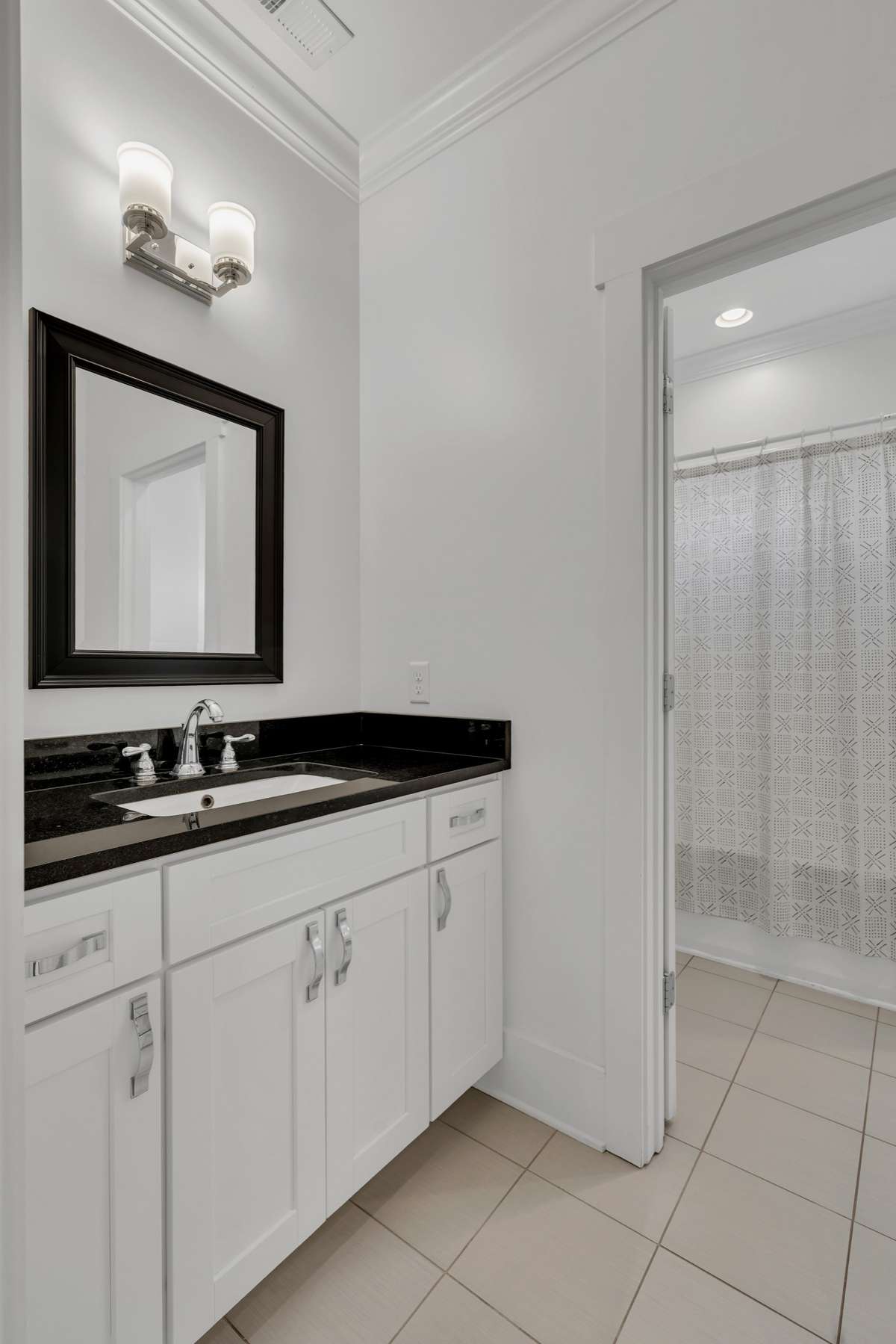 Upstairs Bath cabinets have been freshly painted.