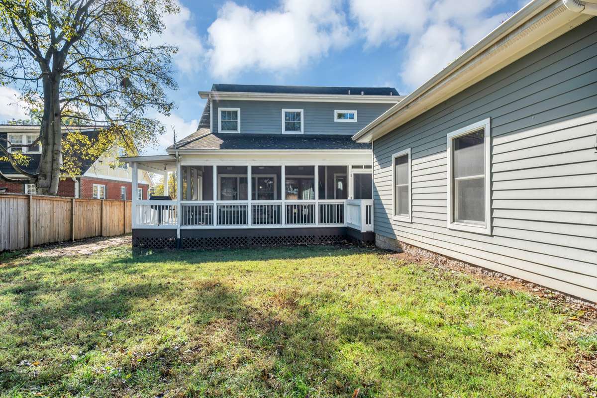 2 - car garage to the right. Lots of fenced yard for kids, pets or quiet evenings.