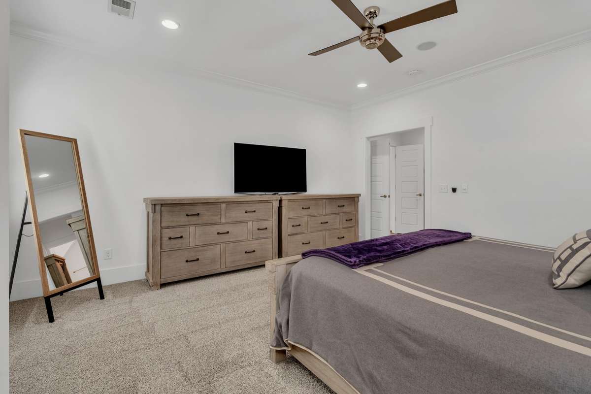 Primary Bedroom with Ensuite Bath and walk-in closet.