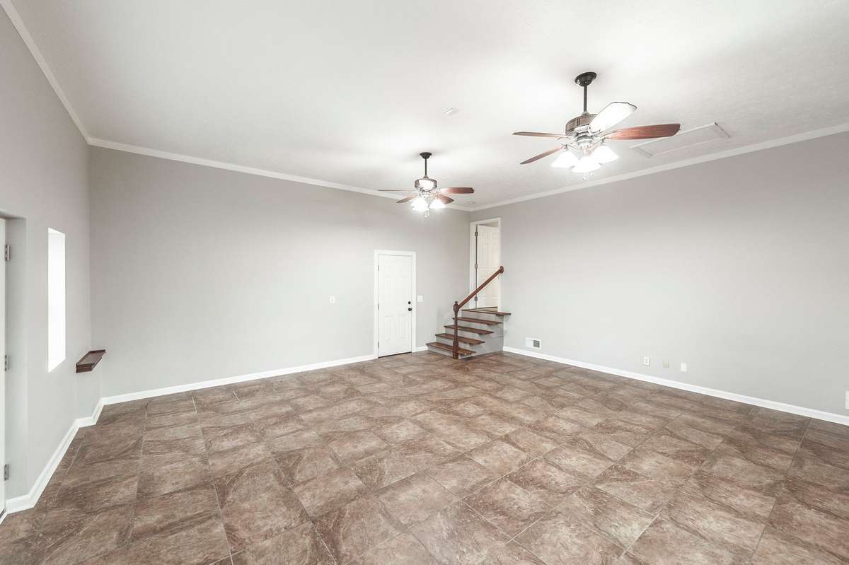 Bonus room w/door exiting to fenced backyard