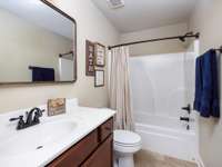 Hall bathroom upstairs with shower/tub combo