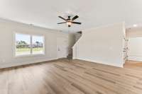 The double-window has a great view of the front yard and covered front porch.