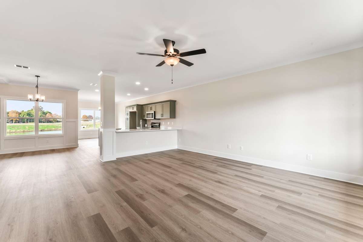 As you walk in the front door you're greeted with soft LVP flooring and a truly open-concept floor plan.