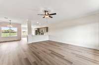 As you walk in the front door you're greeted with soft LVP flooring and a truly open-concept floor plan.