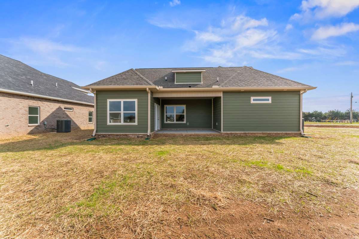 Access to the covered back porch is through the dining area, just off the kitchen.