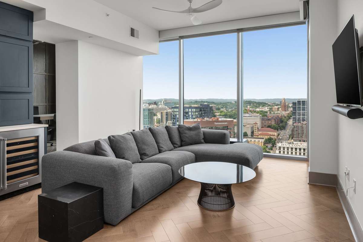 Motorized blinds throughout