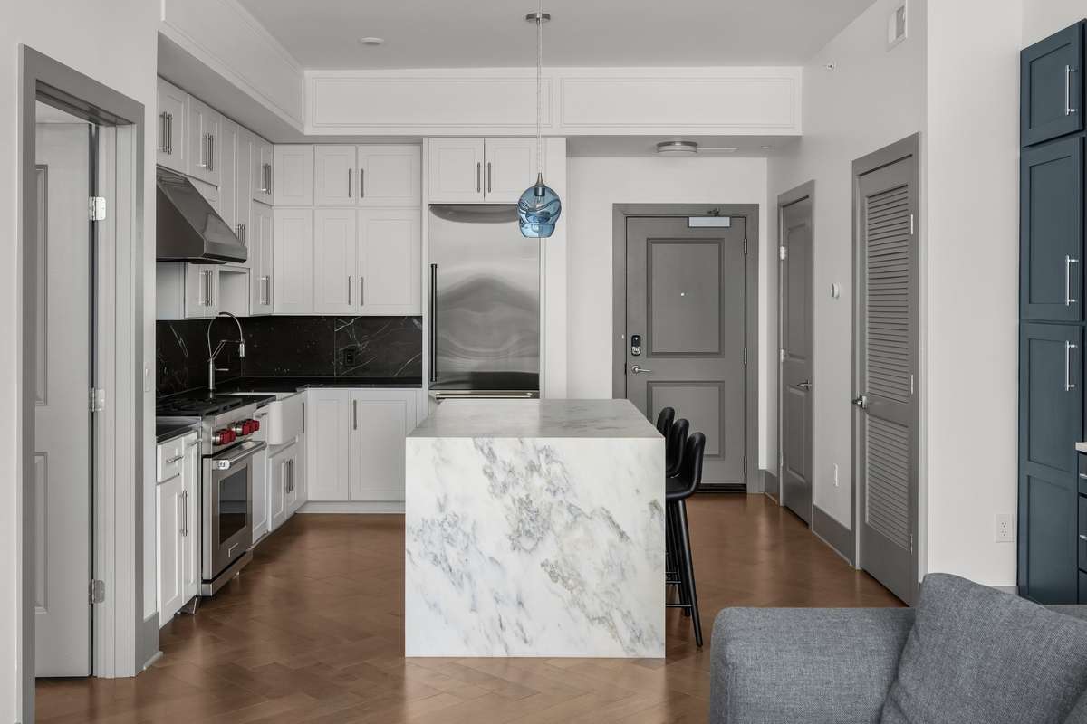 Chef's kitchen with seating at island