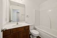 Full bathroom between 2 bedrooms
