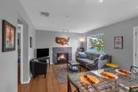 Open living area with expansive views of the river. Cozy up this season with the fire and enjoy all that Downtown Nashville has to offer!