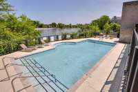 Large community pool overlooking the river!
