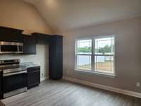 Double Windows in Dining Area for Natural Light. 
Previous House in Photo.
