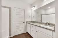 Additional view of main bathroom suite.