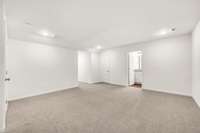 Expansive upstairs retreat offers endless versatility—perfect as a guest suite, playroom, or media space—with convenient attic and HVAC access plus generous storage options.