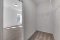 Large walk in closet in owner's bedroom
