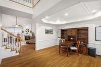 The dining room is currently being used as an office.