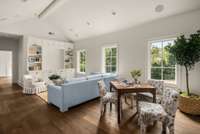 Third floor living room with custom built in cabinetry