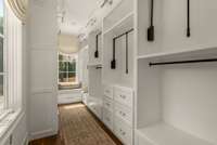 primary custom closet with ample space and storage