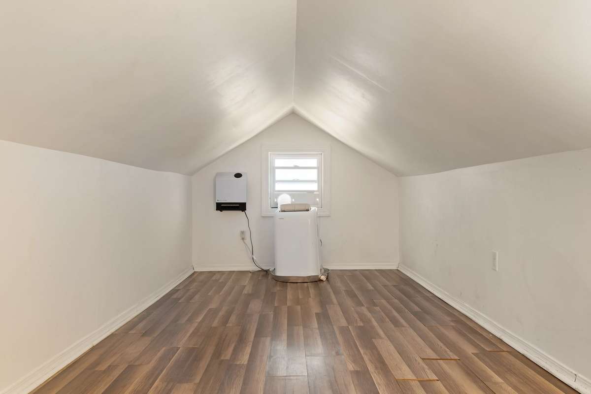 Attic space - accessible from stairs in living room.