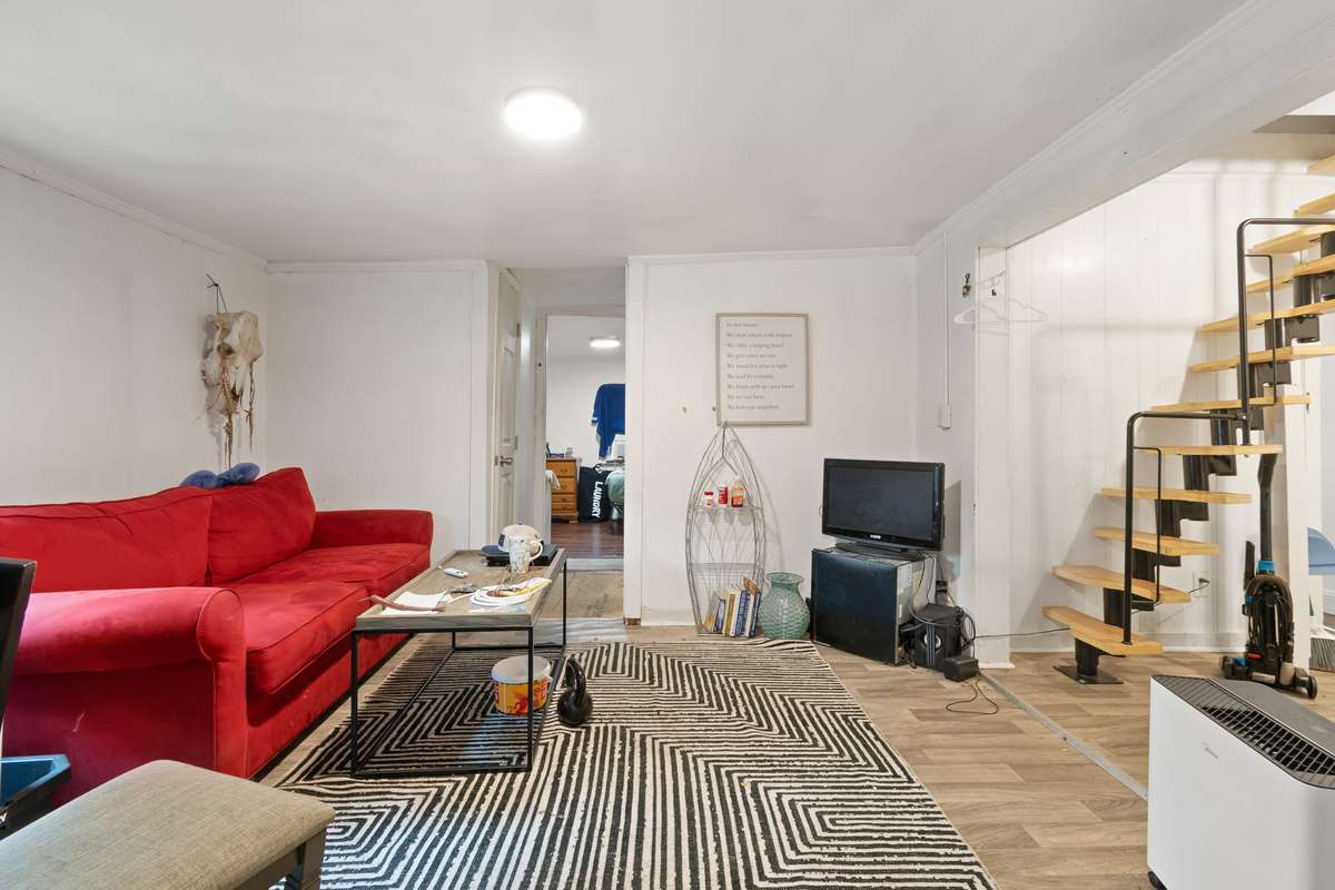 Open living room, dining room and kitchen.