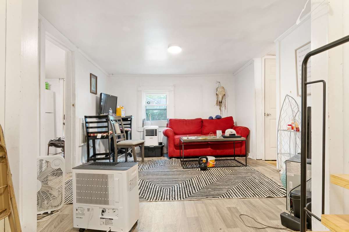 Open living room, dining room and kitchen.