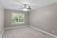 5th Bedroom overlooking the backyard.