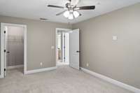 5th Bedroom located on the back side of the home with walk-in closet.