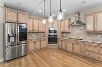 The kitchen was renovated with new granite countertop and backsplash in 2023 and comes with top of the line stainless steel appliances.