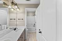 3rd Bathroom located at the end of the upstairs hall and accessible by the 4th Bedroom as well.