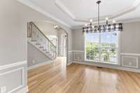 The dining room off the foyer is open and yet still formal.