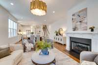 View as you come in from the screened-in porch showing the inviting open-concept space!