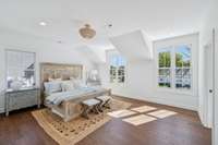 Primary bedroom with lots of natural light, walk-in closet and ensuite bath