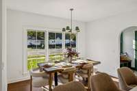 Casual dining space off the kitchen keeps conversations and entertaining flowing