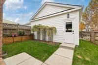 Yard view showing detached garage