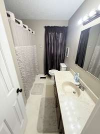 Bath with Shower/Tub combo and 6 ft vanity with single sink