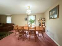 Combination Dining Room and Living Room overlooking front yard