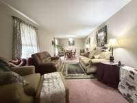 Combination Living Room & Dining Room off from Foyer and overlooking Front yard