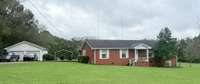 Beautiful home situated on 2 acres with 3 Bed 1.5 Baths with detached 2 car garage and carport;