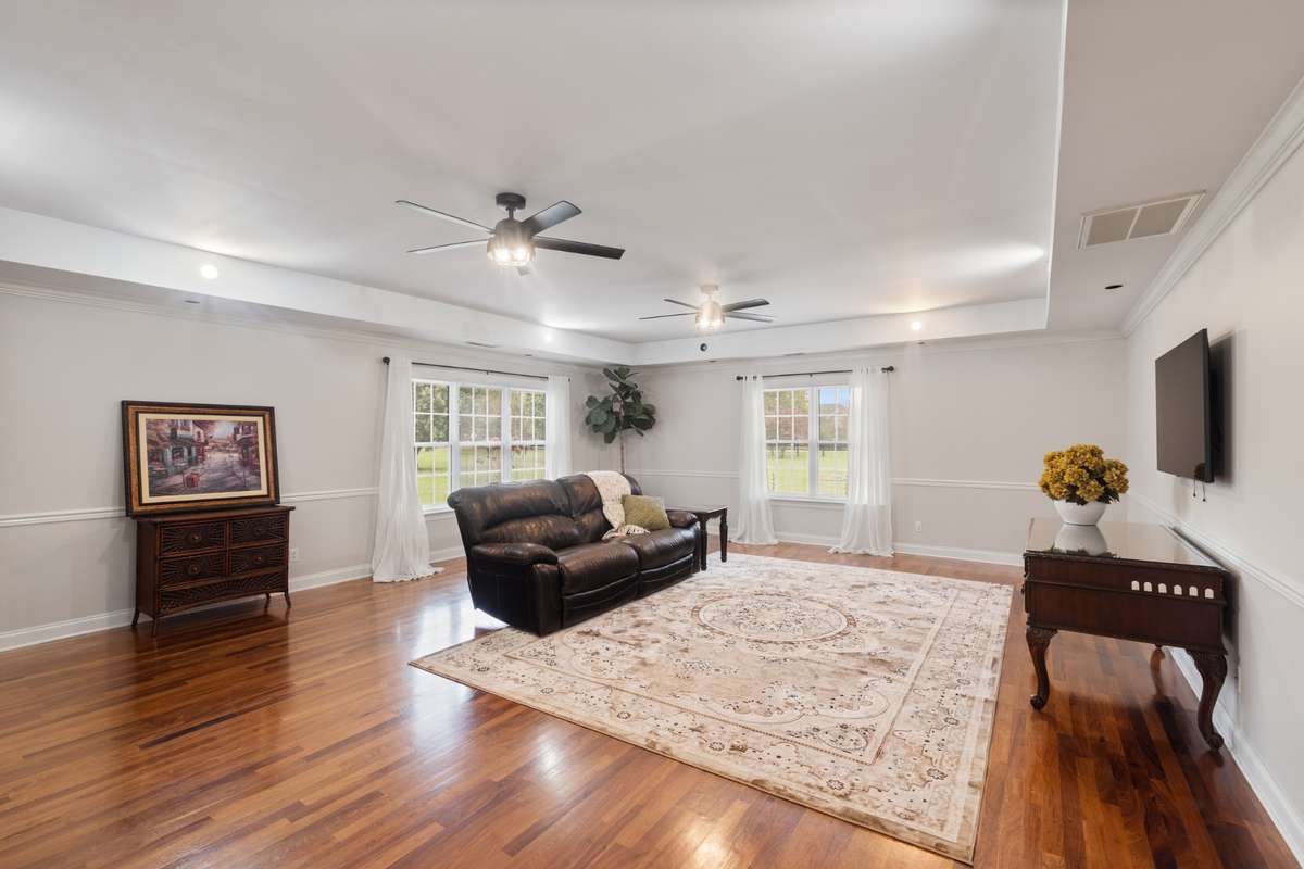 Main level bonus room could be the perfect teen or mother-in-law suite as it has a walk in closet and a full bath.