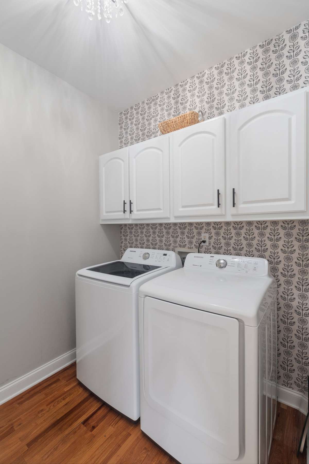 Built in cabinets for additional utility room storage.