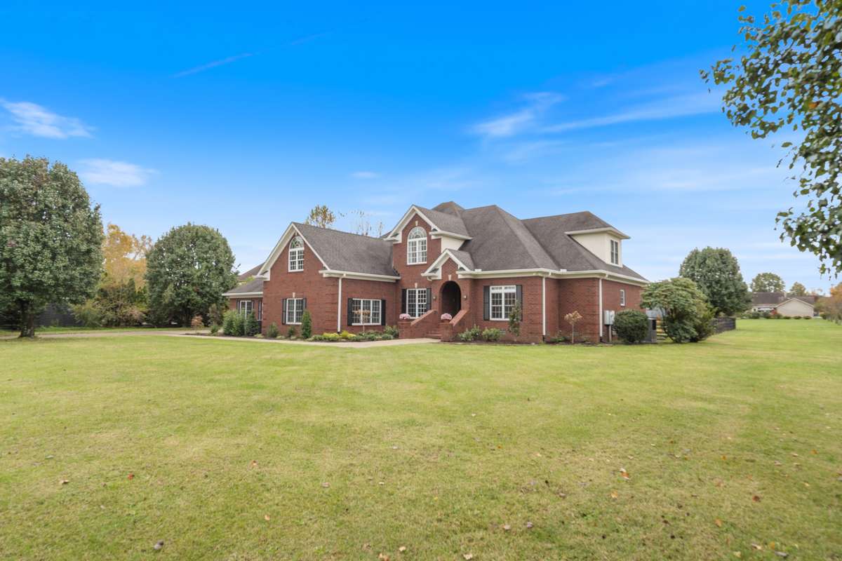 Mature trees on 2 level acres.