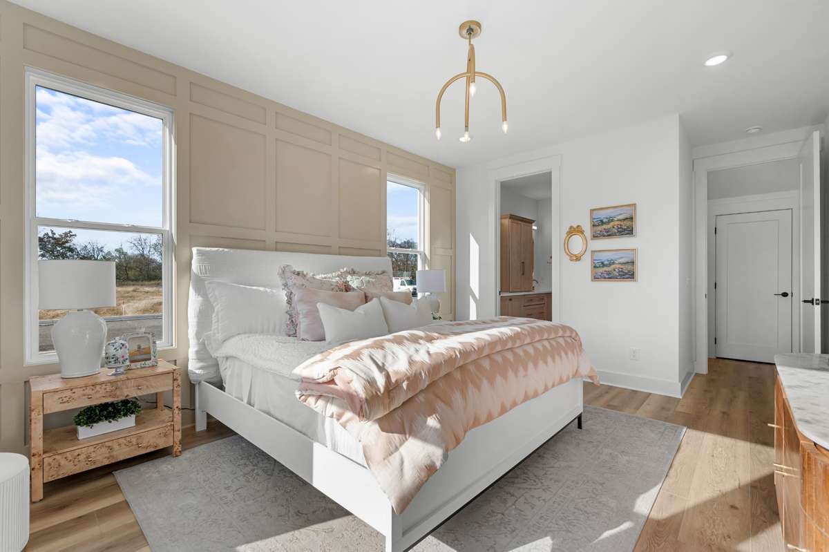 Photos  of Model Home. Floor plans and features may vary.