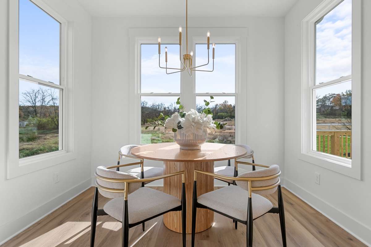 Photos  of Model Home. Floor plans and features may vary.